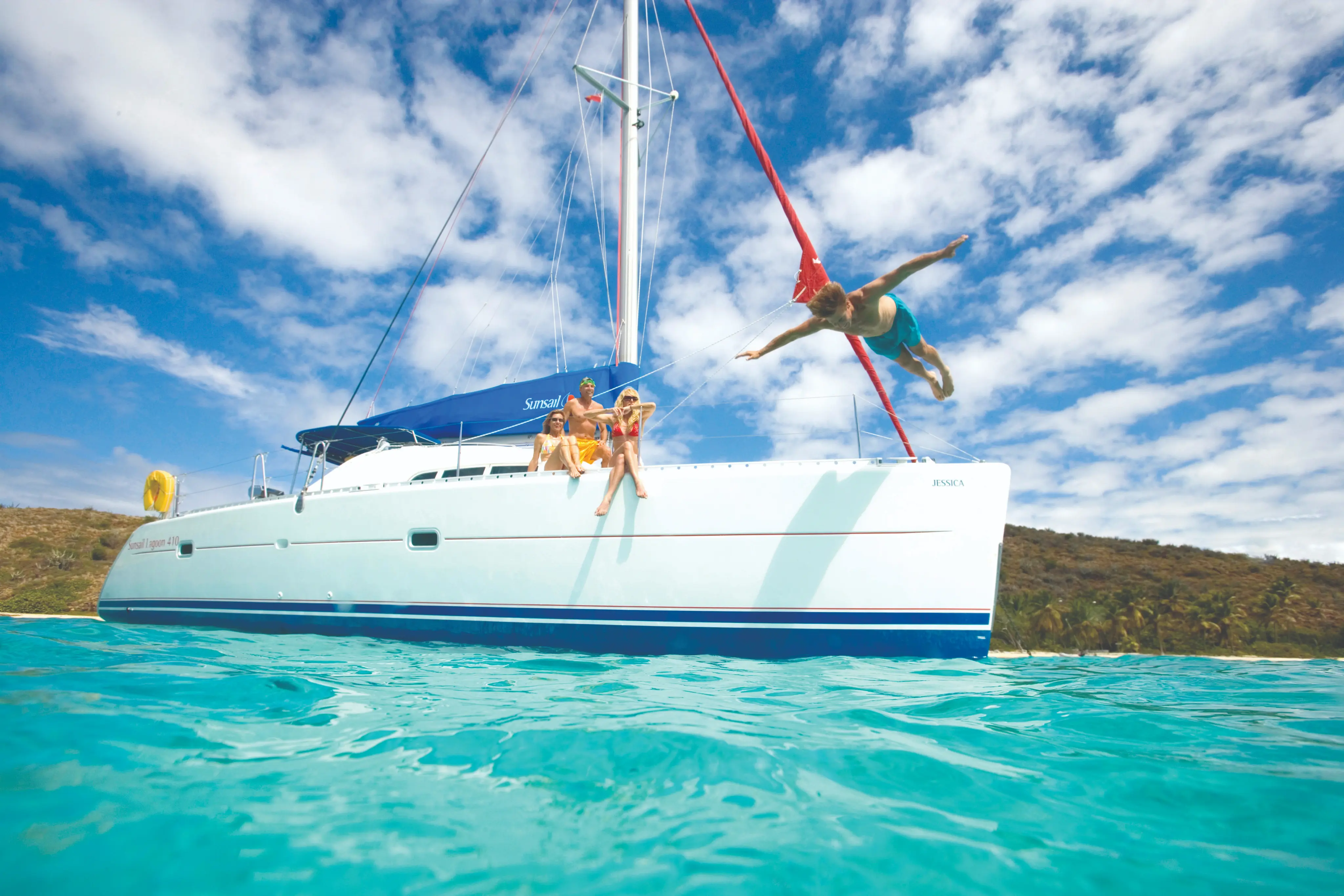 Exterior view of a modern yacht at sunset